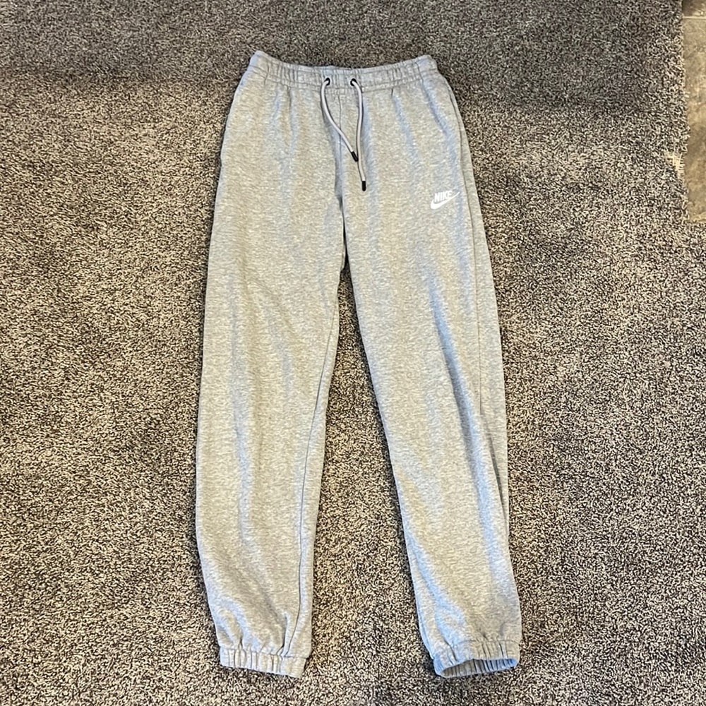 Light grey Nike sweat pants, size small.